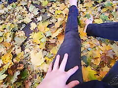 cumming outside in the fall leaves