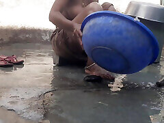 A stepsister from the village undresses and bathes in the open courtyard, a stepbrother watches his stepsister to see her beauti