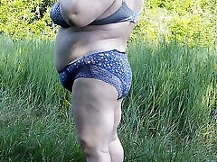 Stepmom undressed in the park and staged a public pissing Stepmom undressed in the park and staged a public pissing
