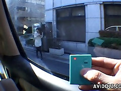 Playful Japanese babe Aimi Nakatani installs a tool in her pussy and walks on a street