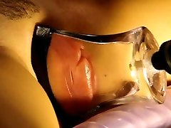 pumped lean mom son lips in a tight, flat glass tube