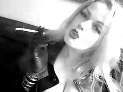 Sexy blonde creaking beds smoking tease in leather