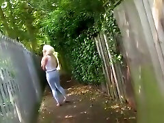 Blonde pissing in public