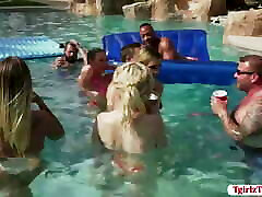 Shemales having group sex by the pool